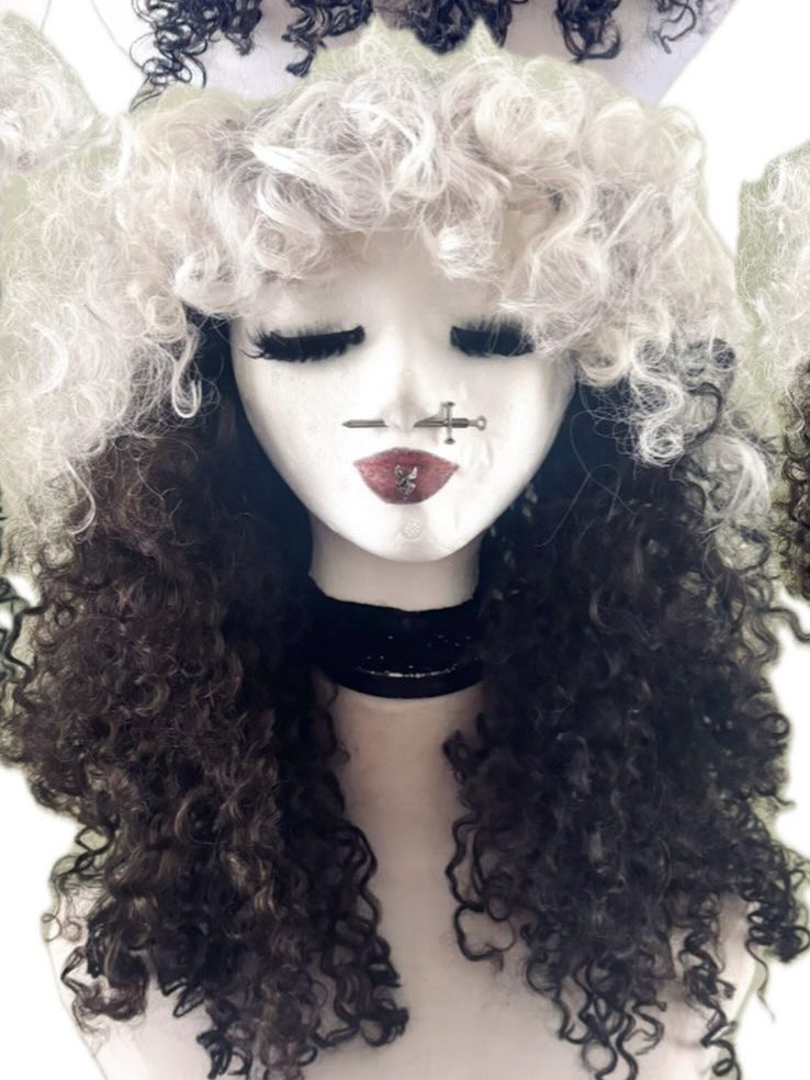 Wig: cream and black