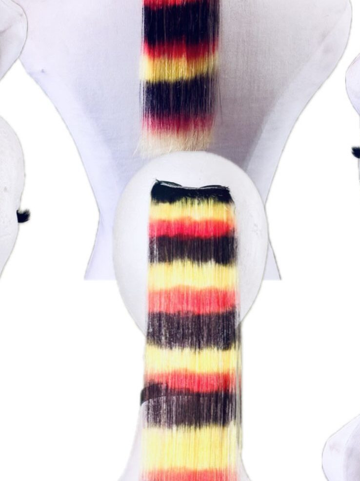 Yellow and black striped hair extension